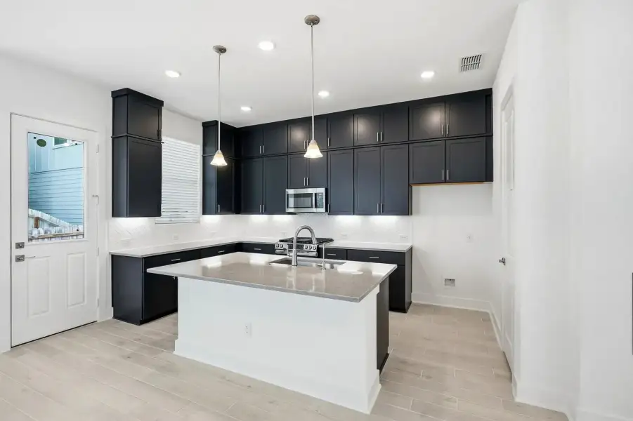 Furnished interior view inside a new home in Rose Hill, San Antonio (Image 9).