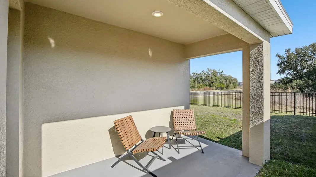 Exterior details and patio area of a home in Angeline, Land O' Lakes (Image 2).