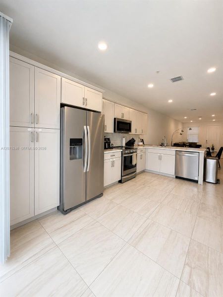 Furnished interior view inside a new home in , Pembroke Pines (Image 12).