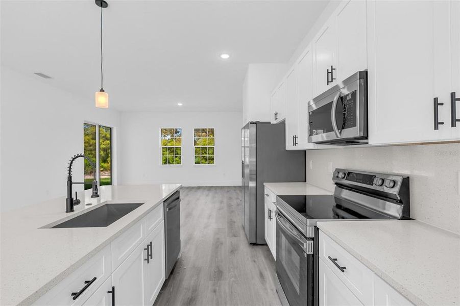 Furnished interior view inside a new home in , Ocala (Image 7).