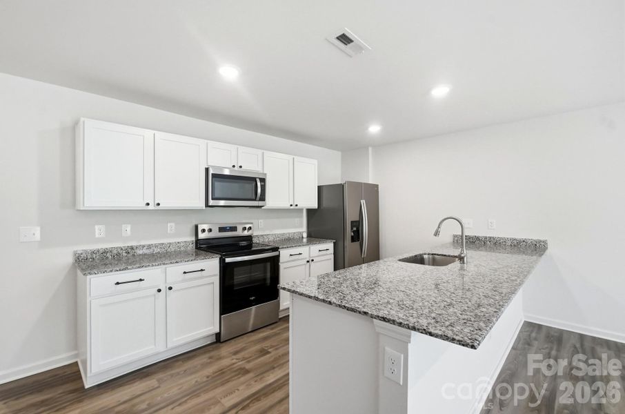 Furnished interior view inside a new home in Trivium, Newton (Image 13).