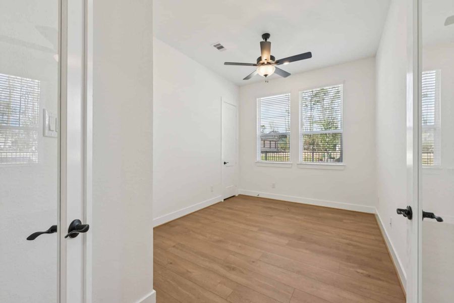 Spacious, unfurnished interior of a new home in The Woodlands Hills, Willis (Image 29).