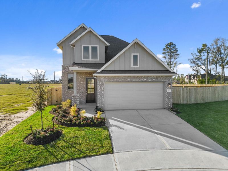Front exterior of a new home in , Spring, TX, highlighting curb appeal (Image 18).