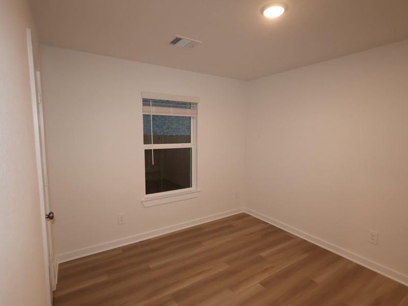Spacious, unfurnished interior of a new home in Wildrye, Waller (Image 25).