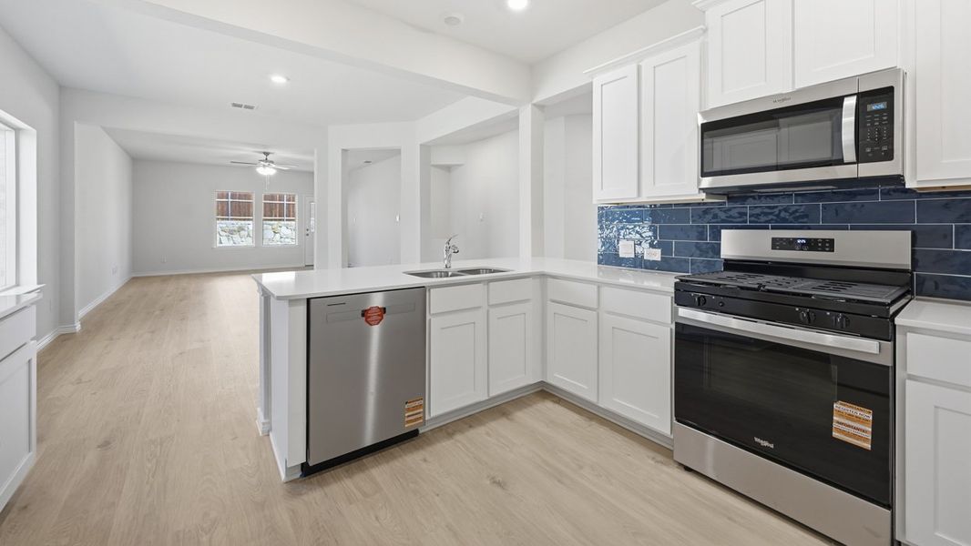Representative furnished interior of a home built from the Tanzanite by D.R. Horton in Silverado, Aubrey (Image 4).