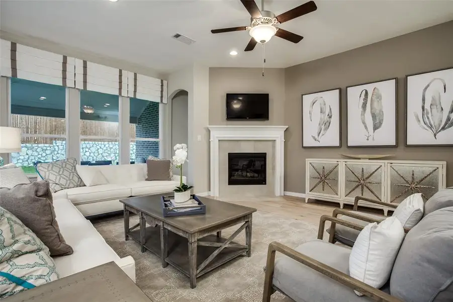 Airy gathering room showcases open concept floorplan *Model representation Airy gathering room showcases open concept floorplan *Model representation
