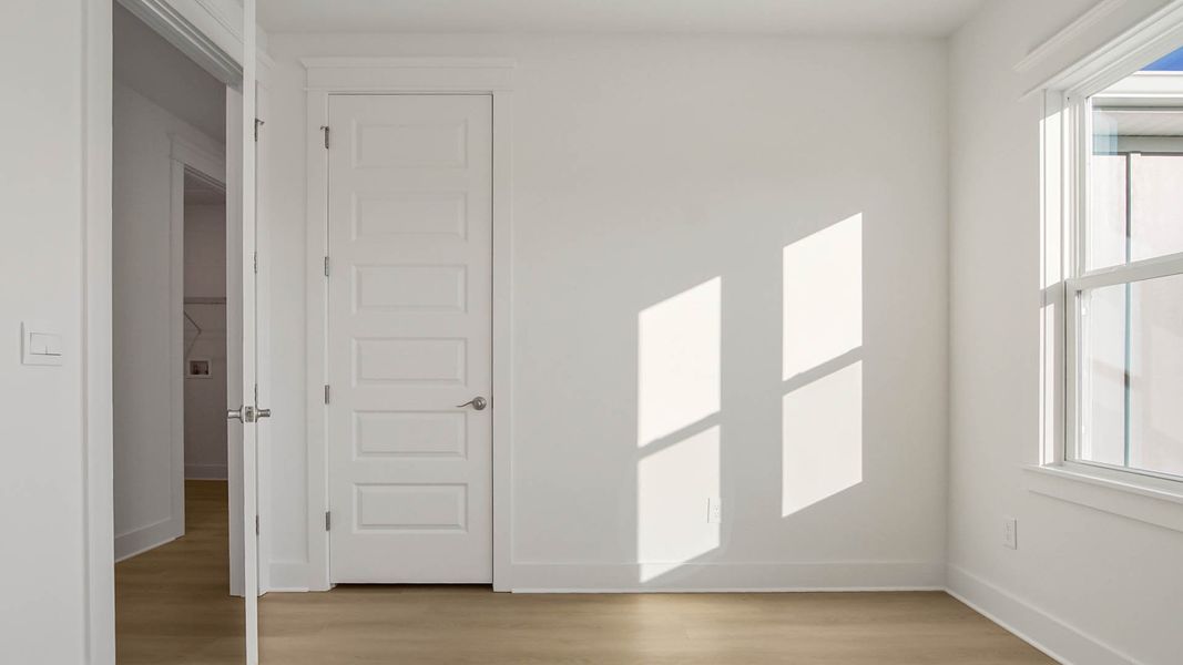 Representative unfurnished interior of a home built from the Trenton by D.R. Horton in Parkside, Santa Rosa Beach (Image 30).