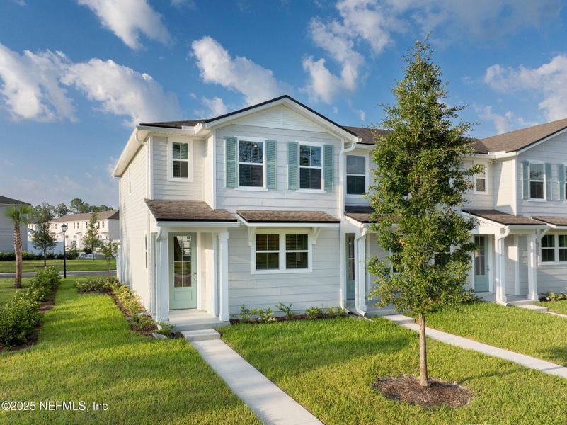Front exterior of a new home in , St. Johns, FL, highlighting curb appeal (Image 2).