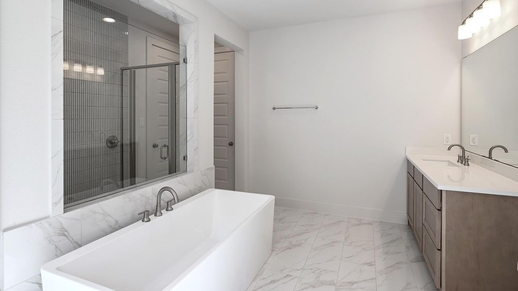 Furnished interior view inside a new home in 6 Creeks, Kyle (Image 10).