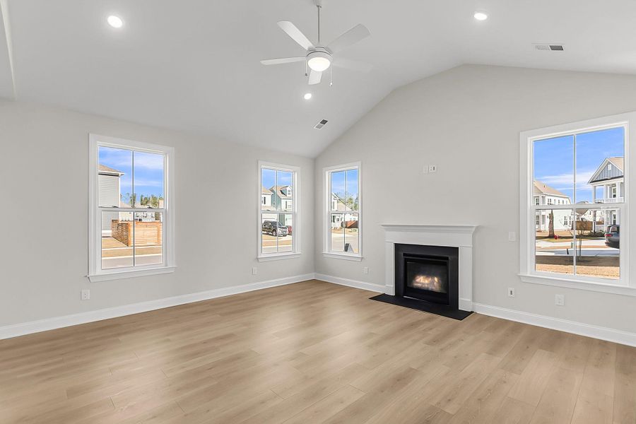 Spacious, unfurnished interior of a new home in Tidewater at Lakes of Cane Bay, Summerville (Image 48).