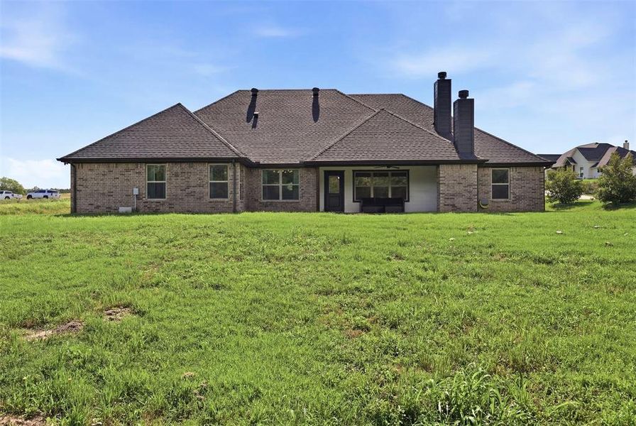 Exterior details and patio area of a home in The Ranches at Valley View, Springtown (Image 3).
