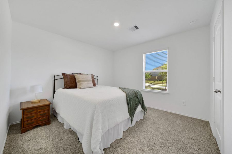 Furnished interior view inside a new home in The Canopies, Splendora (Image 13).