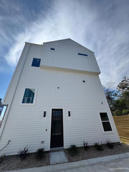 Exterior details and patio area of a home in , Houston (Image 3).