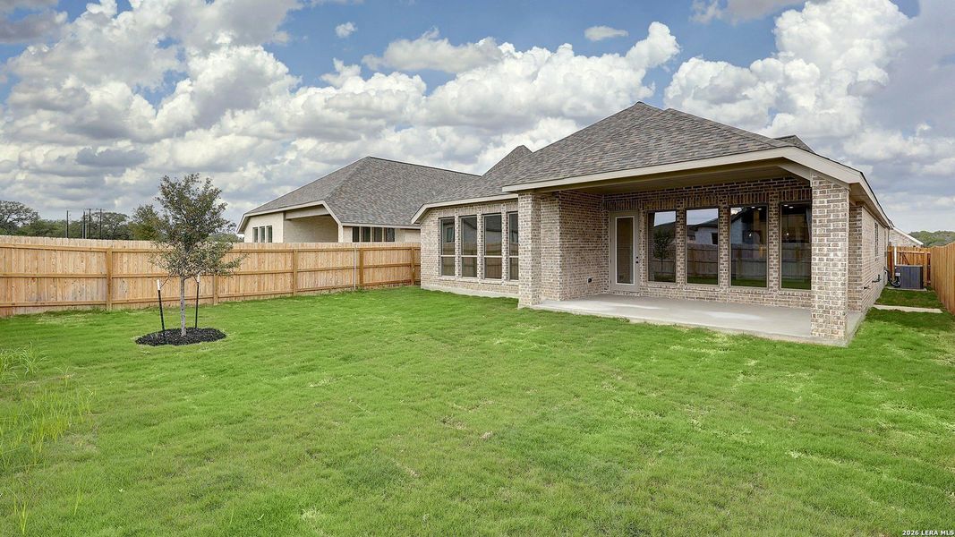 Exterior details and patio area of a home in Alsatian Oaks, Castroville (Image 30).