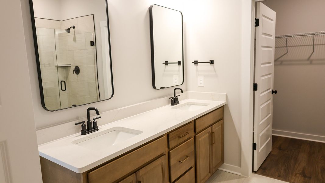 Representative furnished interior of a home built from the STONEBROOK II by D.R. Horton in Harvest Point, Spring Hill (Image 14).