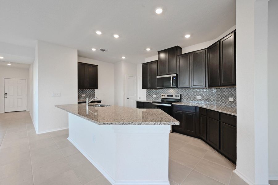 Furnished interior view inside a new home in Stoney Chase, Del Valle (Image 10).