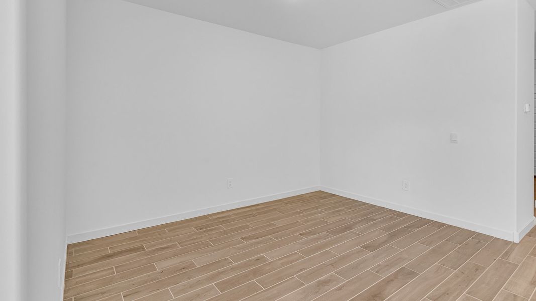 Representative unfurnished interior of a home built from the Harris by D.R. Horton in The Oasis at Rocking K, Vail (Image 30).