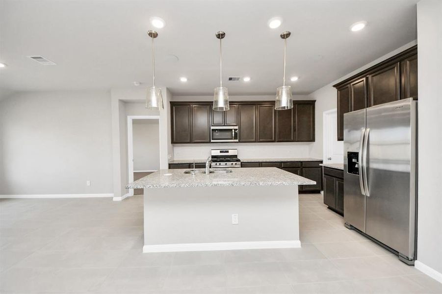Furnished interior view inside a new home in Sweetgrass Village, Crosby (Image 7).