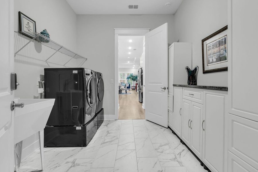 Furnished interior view inside a new home in K. Hovnanian's® Four Seasons at Lakes of Cane Bay, Summerville (Image 42).