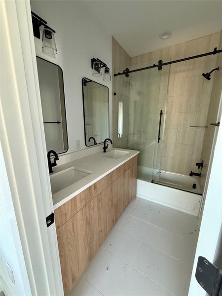 Private bath inside bedroom 2 upstairs. Private bath inside bedroom 2 upstairs.