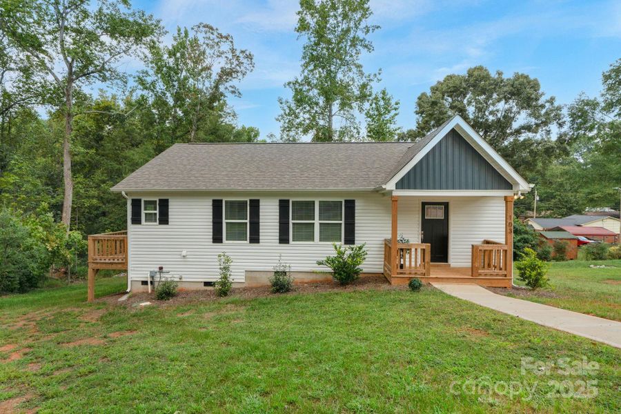 Front exterior of a new home in , Forest City, NC, highlighting curb appeal (Image 13).