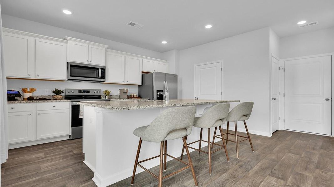 Furnished interior view inside a new home in The Ranch, Holly Hill (Image 7).