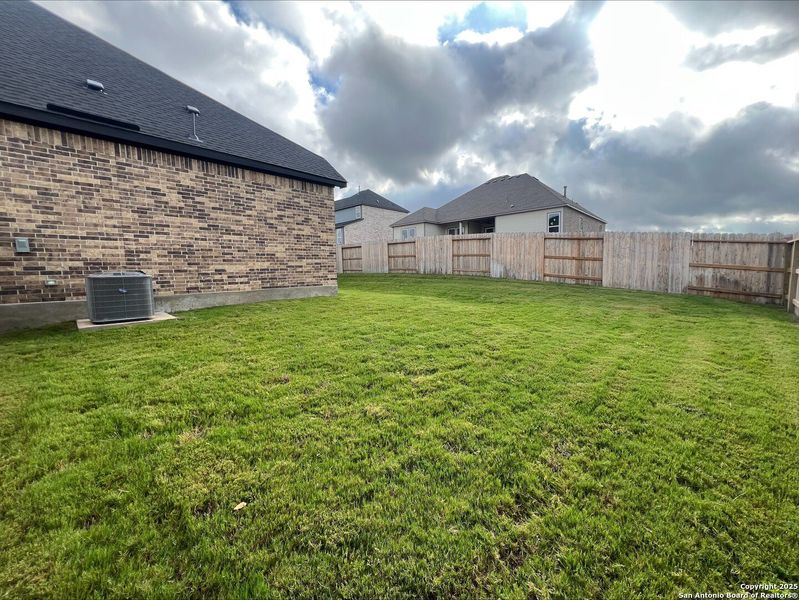 Front exterior of a new home in , Castroville, TX, highlighting curb appeal (Image 15). Front exterior of a new home in , Castroville, TX, highlighting curb appeal (Image 15).