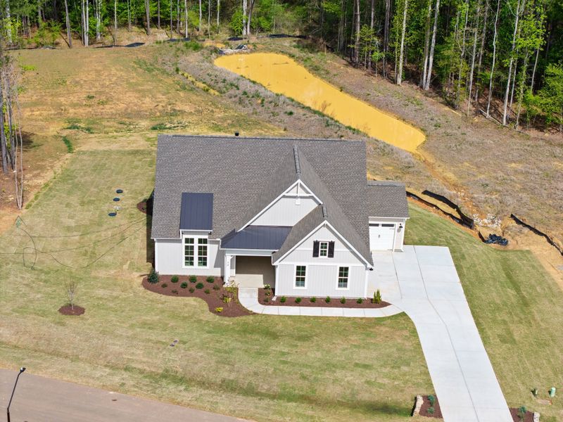Representative exterior photo of a completed home built from the The Bradley by RobuckHomes in Baylee Ridge, Selma, NC (Image 59). Representative exterior photo of a completed home built from the The Bradley by RobuckHomes in Baylee Ridge, Selma, NC (Image 59).
