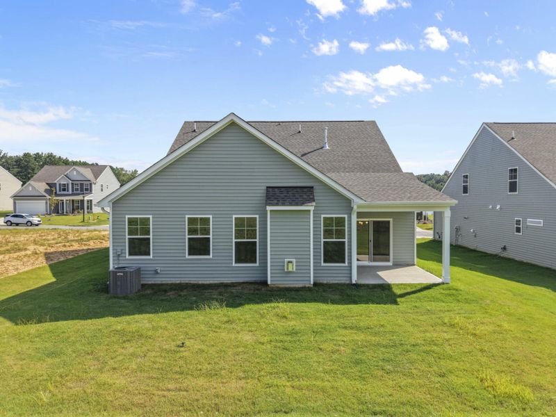 Front exterior of a new home in Hopewell Garden, Winston-Salem, NC, highlighting curb appeal (Image 21). Front exterior of a new home in Hopewell Garden, Winston-Salem, NC, highlighting curb appeal (Image 21).
