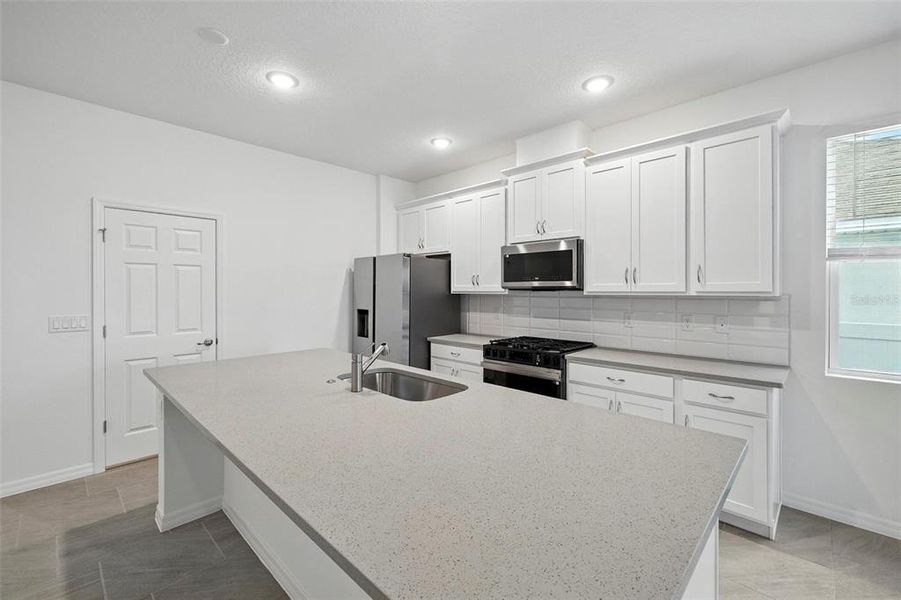 Furnished interior view inside a new home in Eagletail Landings, Howey-in-the-Hills (Image 4).
