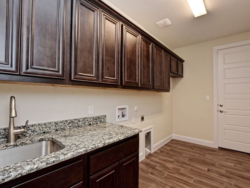 Representative furnished interior of a home built from the San Simeon I by Giddens Homes in Clearwater Ranch, Liberty Hill (Image 334).