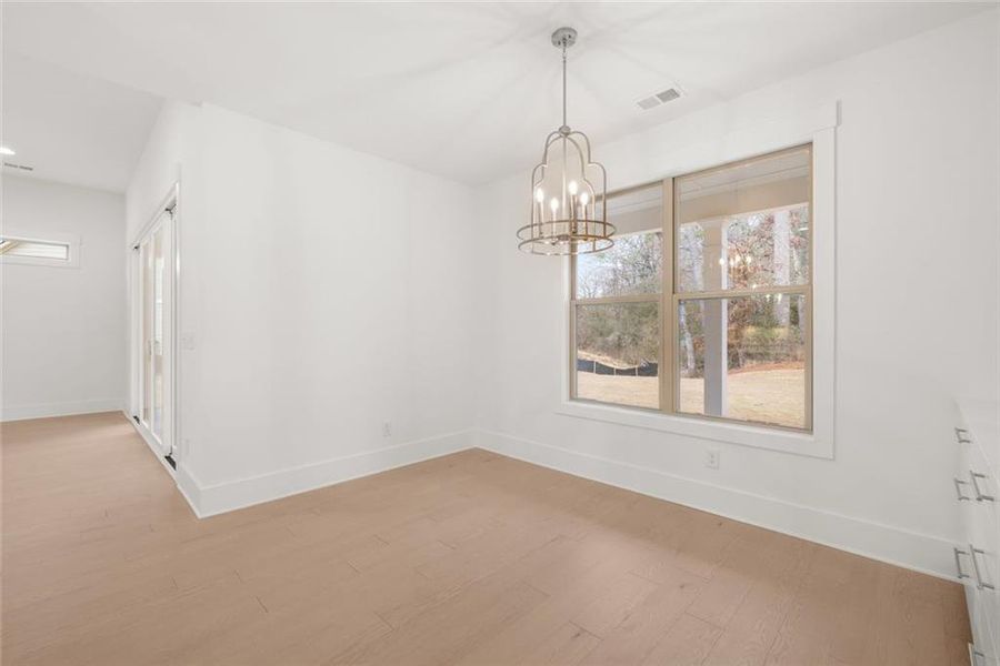 Spacious, unfurnished interior of a new home in Soleil Belmont Park, Canton (Image 22).