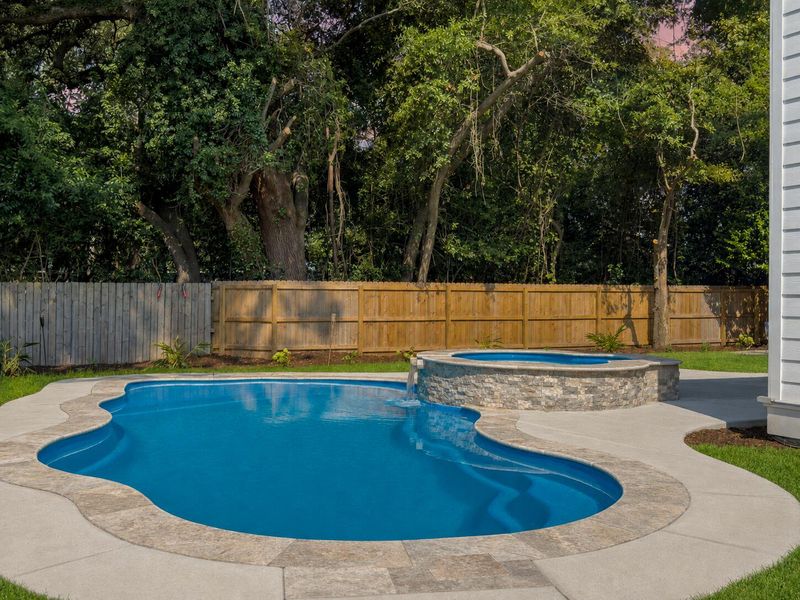Exterior details and patio area of a home in , James Island (Image 31).