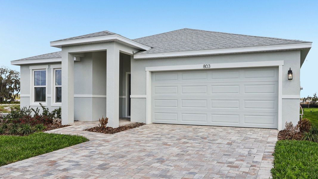 Representative exterior photo of a completed home built from the Castaway Multi-Gen by DRB Homes in Hamilton Bluff, Haines City, FL (Image 23).
