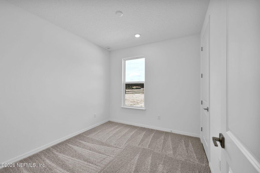 Spacious, unfurnished interior of a new home in Del Webb Wildlight, Yulee (Image 22).