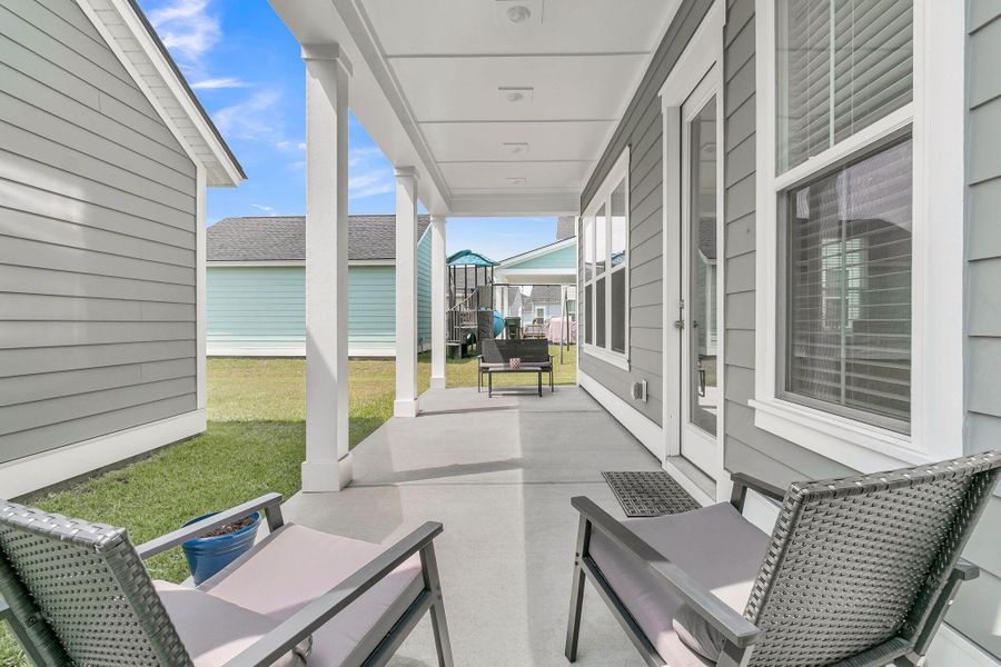 Exterior details and patio area of a home in Carnes Crossroads, Summerville (Image 4). Exterior details and patio area of a home in Carnes Crossroads, Summerville (Image 4).