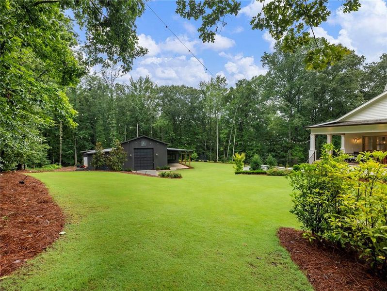 Front exterior of a new home in , Buford, GA, highlighting curb appeal (Image 26). Front exterior of a new home in , Buford, GA, highlighting curb appeal (Image 26).