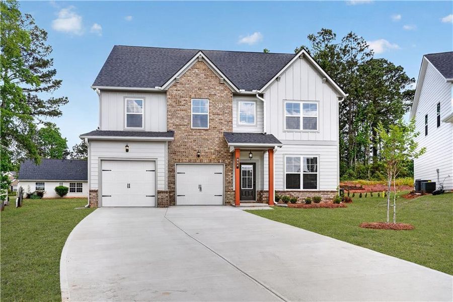 Front exterior of a new home in , Villa Rica, GA, highlighting curb appeal (Image 2). Front exterior of a new home in , Villa Rica, GA, highlighting curb appeal (Image 2).