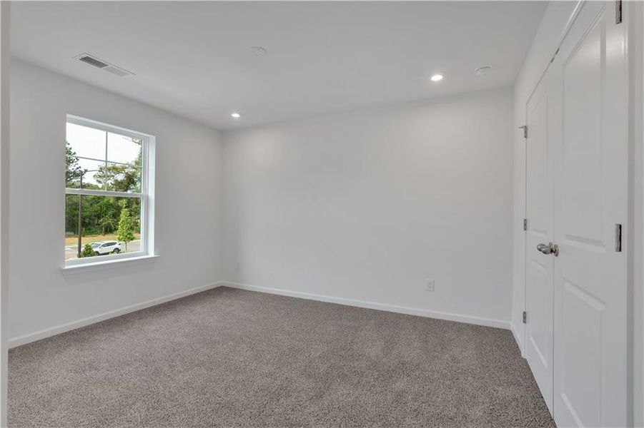 Spacious, unfurnished interior of a new home in The Overlook at Factory Shoals, Mableton (Image 27).