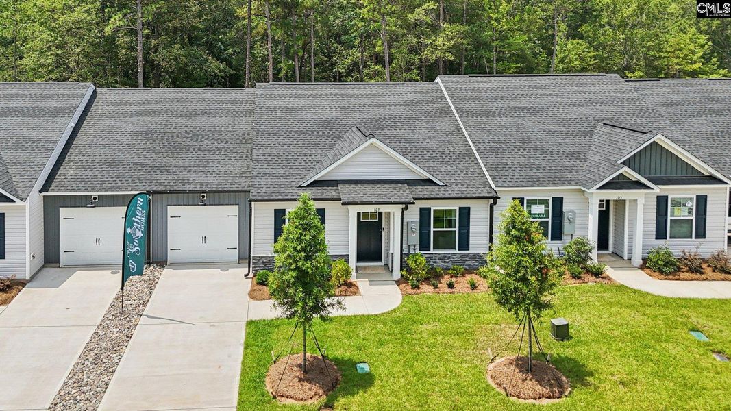 Front exterior of a new home in Piney Woods Bluff, Columbia, SC, highlighting curb appeal (Image 22). Front exterior of a new home in Piney Woods Bluff, Columbia, SC, highlighting curb appeal (Image 22).