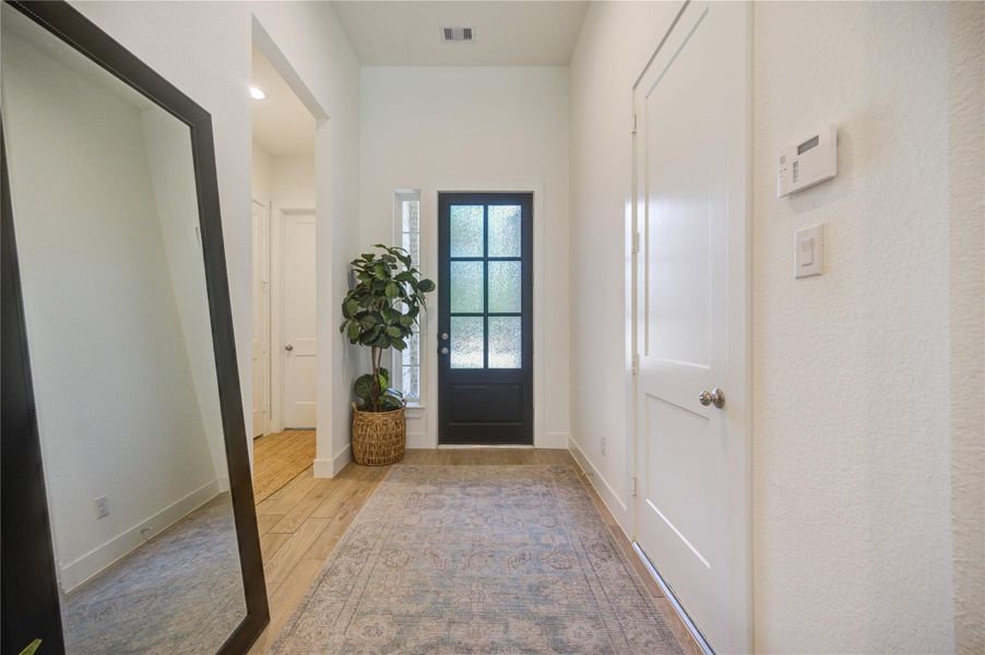 Step inside to a bright entry that sets the tone for the spacious layout beyond. Step inside to a bright entry that sets the tone for the spacious layout beyond.
