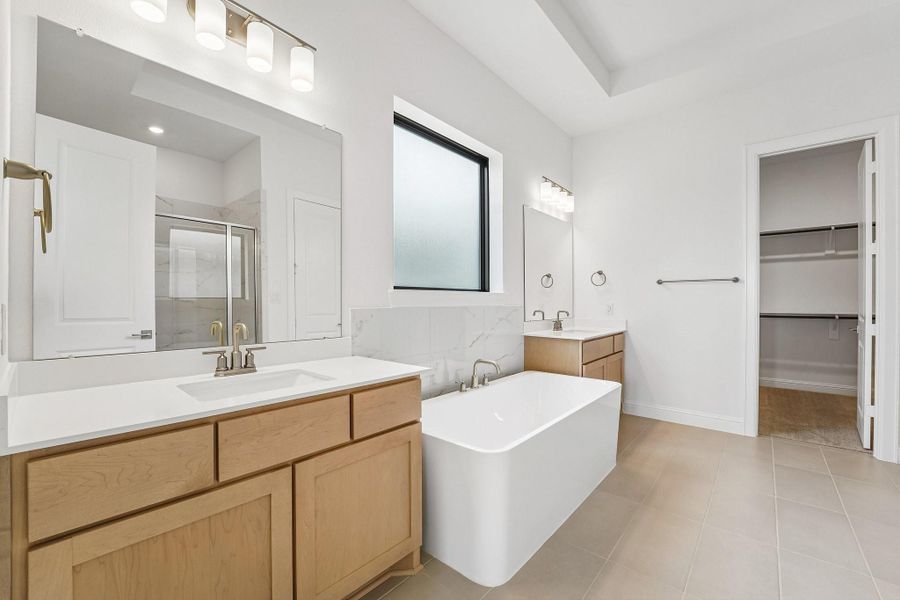 Furnished interior view inside a new home in Del Bello Lakes 60', Manvel (Image 14).