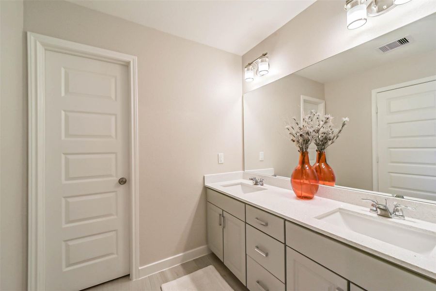 Photos are sample images from a previously built home with the same floor plan. Finishes and fixtures in the current home have been upgraded and may vary. Photos are sample images from a previously built home with the same floor plan. Finishes and fixtures in the current home have been upgraded and may vary.