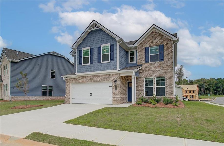 Front exterior of a new home in Westminster, Covington, GA, highlighting curb appeal (Image 14).