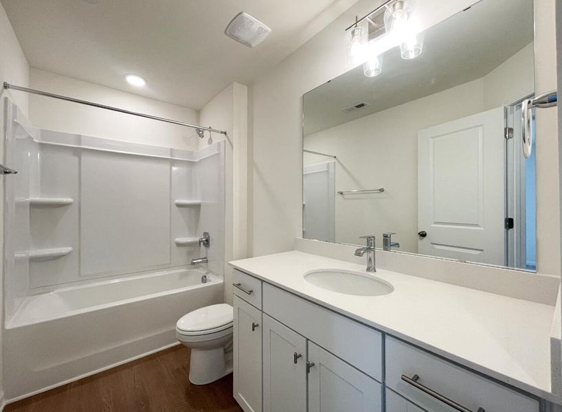 Furnished interior view inside a new home in Bellevue Townhomes, Greenville (Image 9).