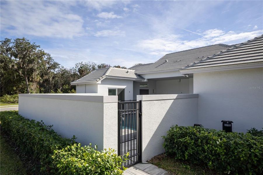 Exterior details and patio area of a home in Toscana, Palm Coast (Image 27).