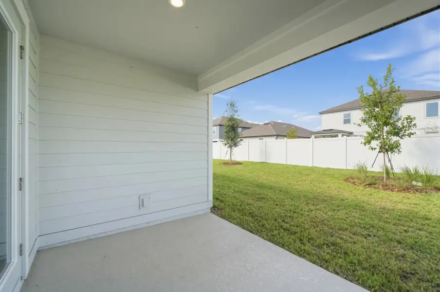 Exterior details and patio area of a home in Trailside, Mount Dora (Image 3).