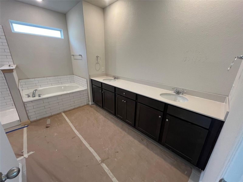 In-progress construction of a new home in The Cottages at Lariat, Liberty Hill, TX (Image 17).