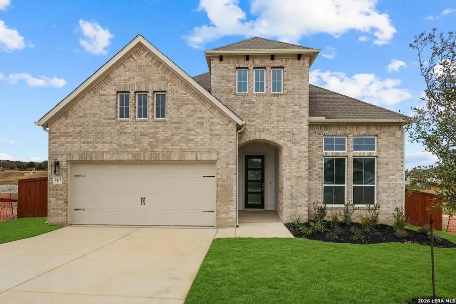 Front exterior of a new home in Homestead, Schertz, TX, highlighting curb appeal (Image 1). Front exterior of a new home in Homestead, Schertz, TX, highlighting curb appeal (Image 1).