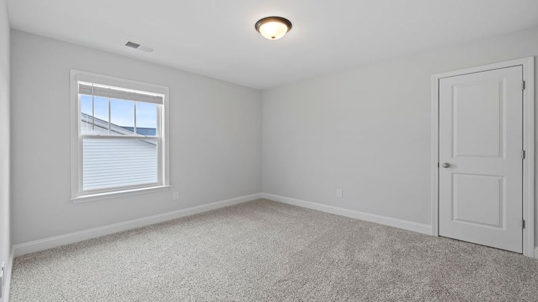 Spacious, unfurnished interior of a new home in Rutledge Estates, Woodruff (Image 28).